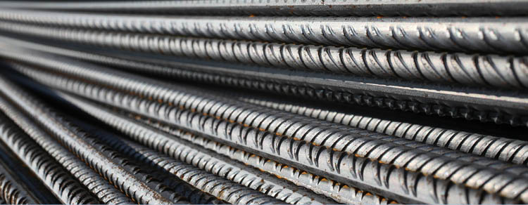 Stack of steel rebars for reinforcing concrete on a construction site. More pictures are in this lightbox: