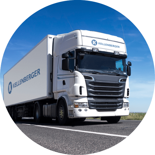 Front view of a goods truck on the road.